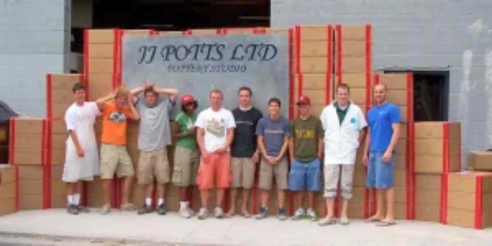 The early JJ Potts team in front of the JJ Potts LTD Pottery Studio
